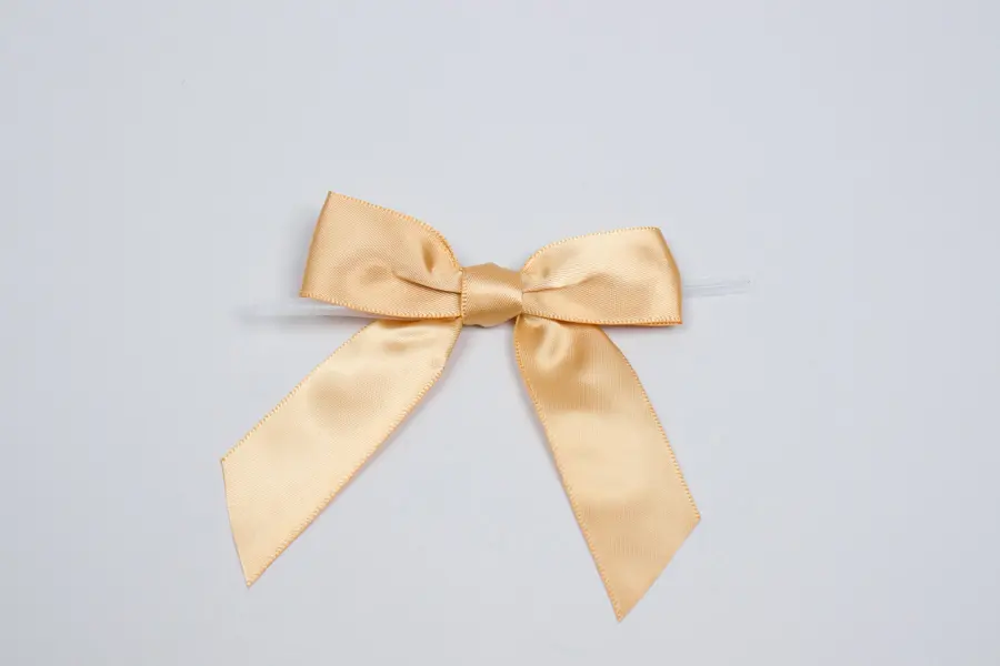 3" X 2-3/4" SATIN GOLD PRE-TIED BOW CLEAR TWIST TIE