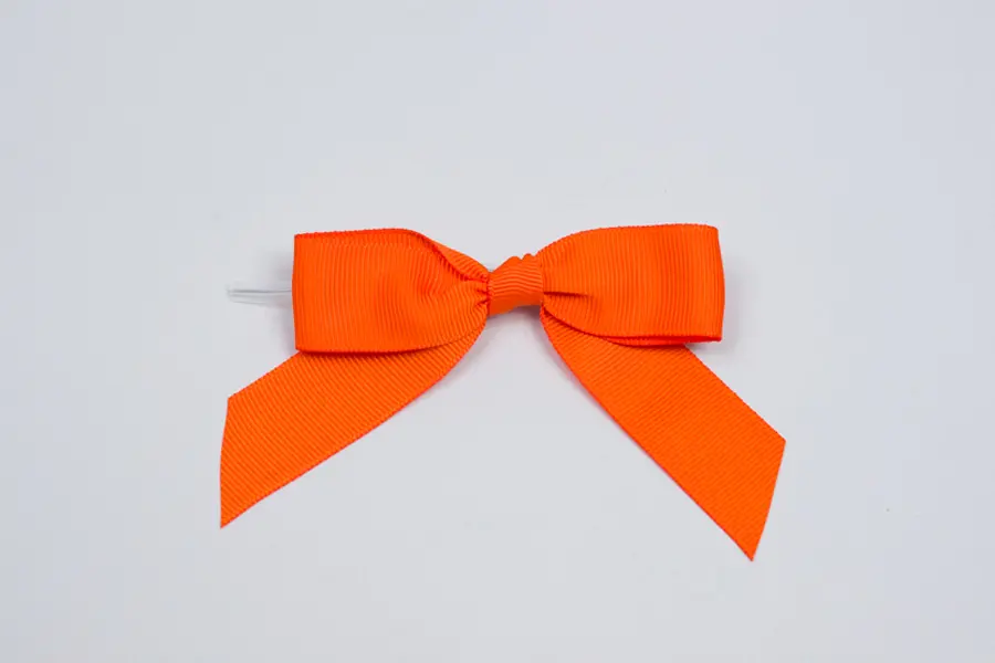 3-1/2" X 2-3/4" GROSGRAIN SOLID ORANGE PRE-TIED BOW CLEAR TWIST TIE