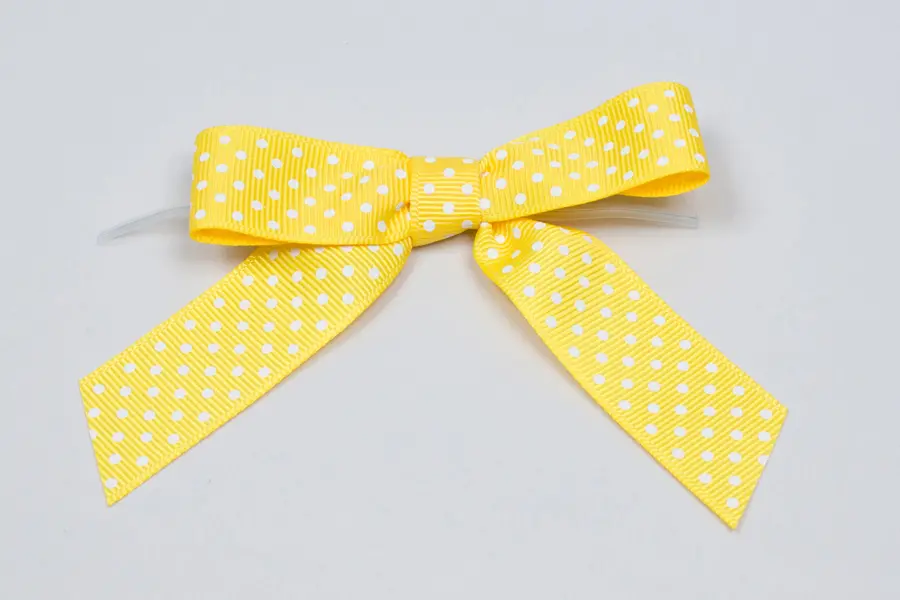 3-1/2" X 2-3/4" GROSGRAIN POLKA-DOT MAIZE PRE-TIED BOW CLEAR TWIST TIE