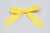 3-1/2" X 2-3/4" GROSGRAIN POLKA-DOT MAIZE PRE-TIED BOW CLEAR TWIST TIE